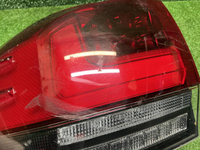 Фонарь левый внешний Toyota Land Cruiser 300 21-нв