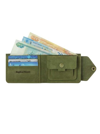 Фото компактного портмоне Всевидящее Око из зеленого нубука, с наполнением.