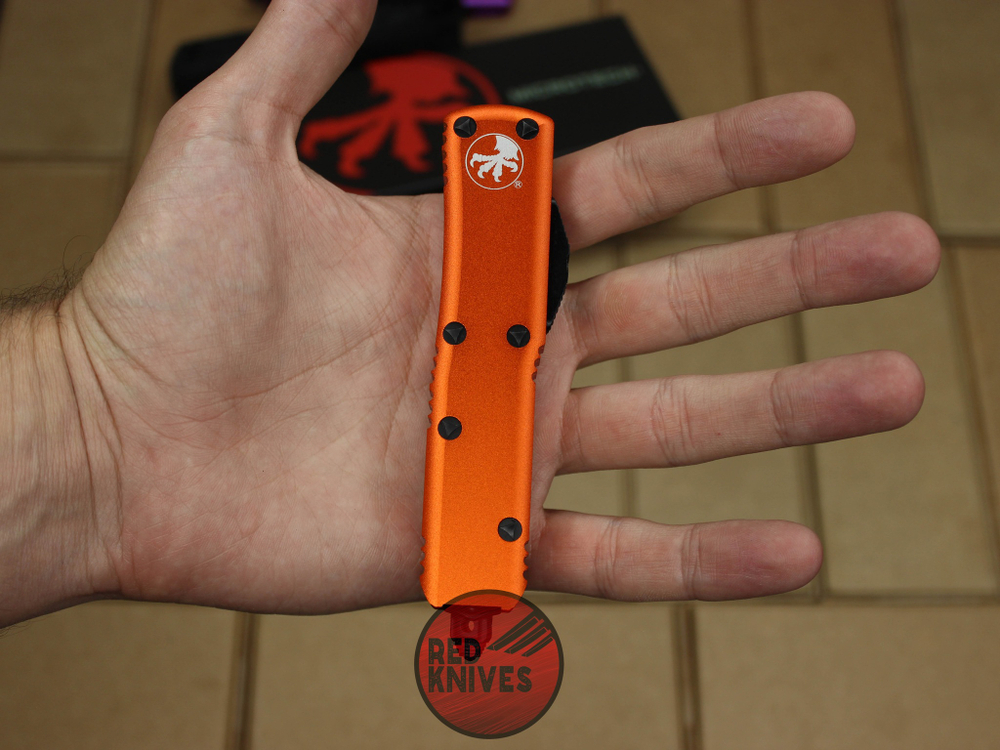 Нож Microtech UTX-85 T/E - оранжевая рукоять, танто клинок, черный RK-396