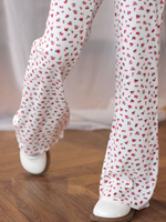 Брюки-легинсы клеш из "лапши в рубчик", белый в мелкий цветочек