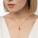 Подвеска «Морской конёк» из красного золота с янтарём