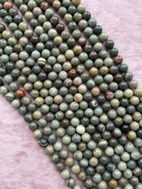 Нить бусин из яшмы 10,5мм