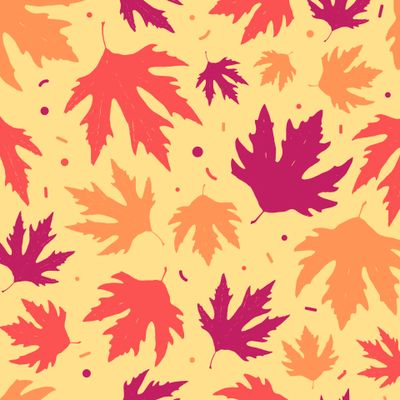 бесшовный паттерн с кленовыми листьями на светло-желтом фоне