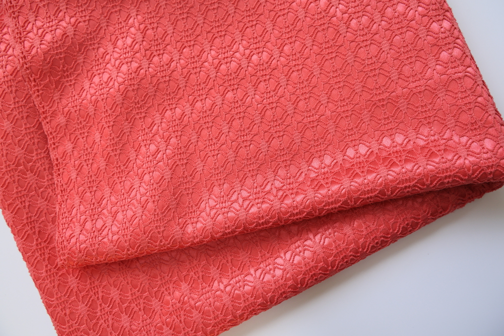 Полотно вязаное на трикотаже коралловое