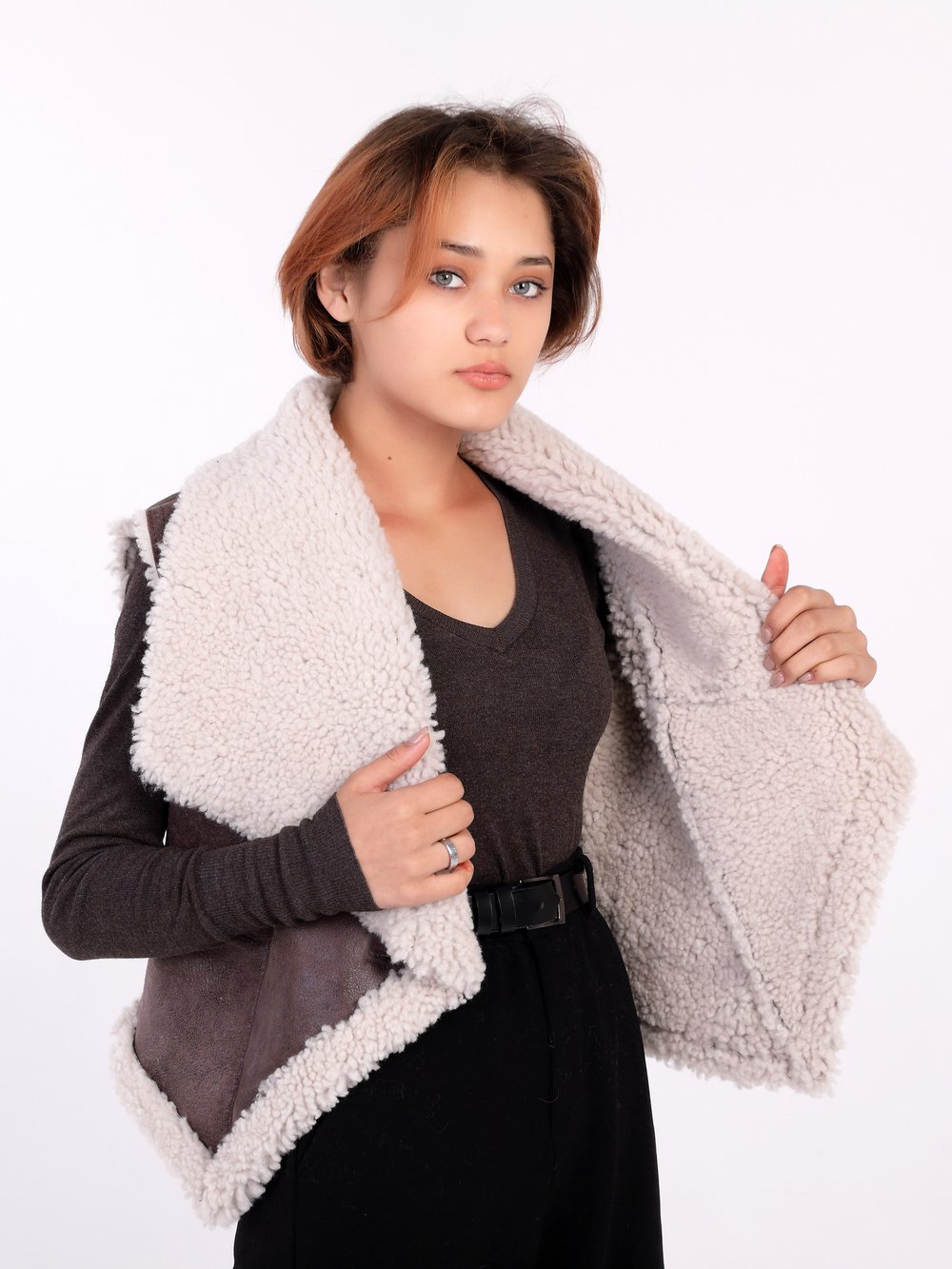 Женская жилетка