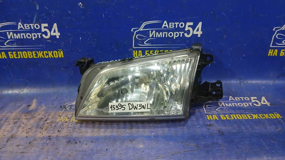 Фара передняя левая MAZDA DEMIO 1999-2002