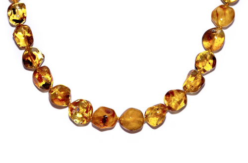 Бусы из цельного янтаря "кусанка" с включениями, длина 50 см, диаметр бусин 1,5 см