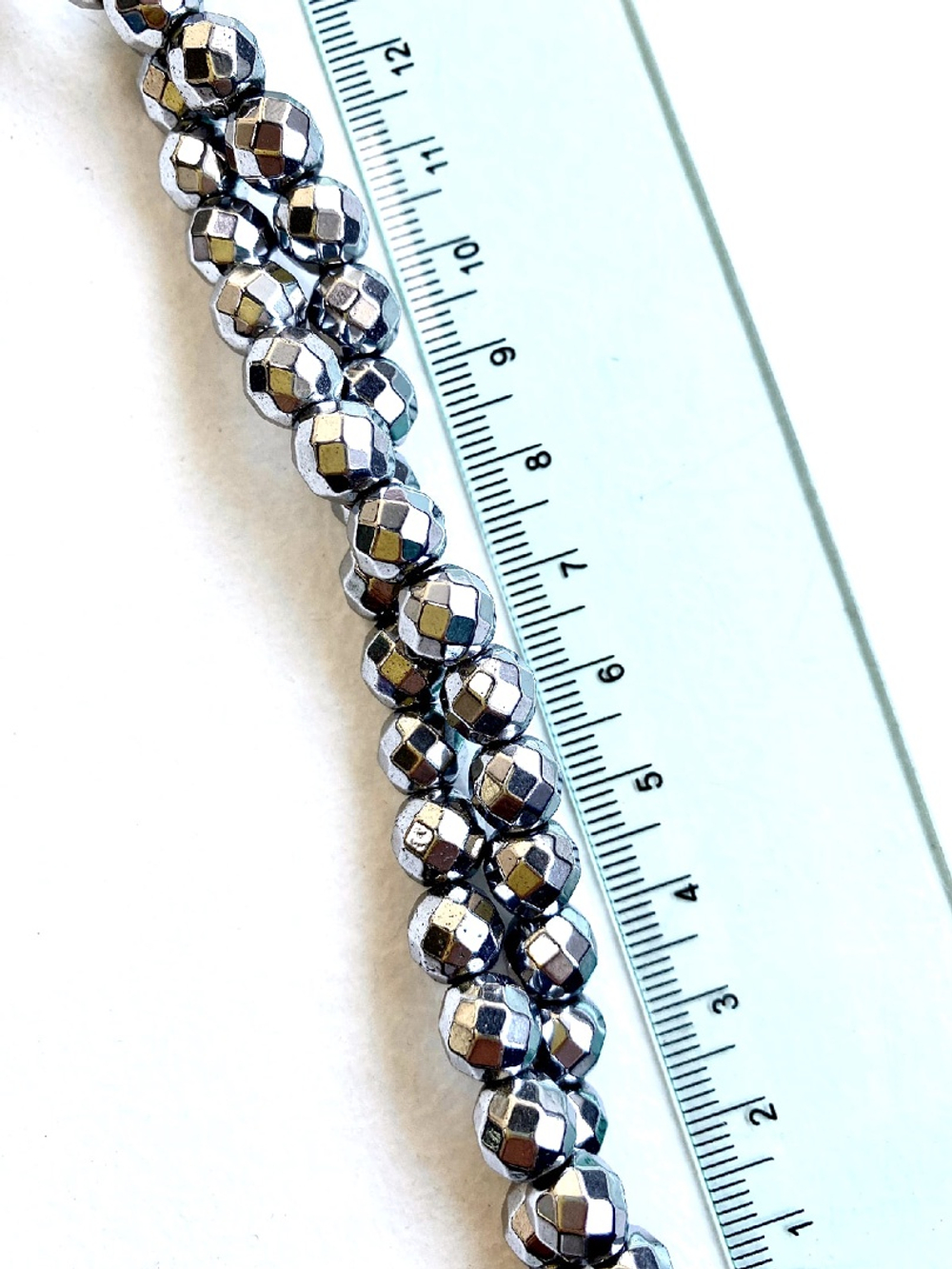 гшо8-с Гематит синт. шар огранка 8мм, серебро, 38см