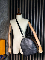 Сумка дорожная из кожи крокодила Louis Vuitton