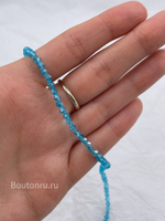 Бусины стеклянные биконусы на нити голубые