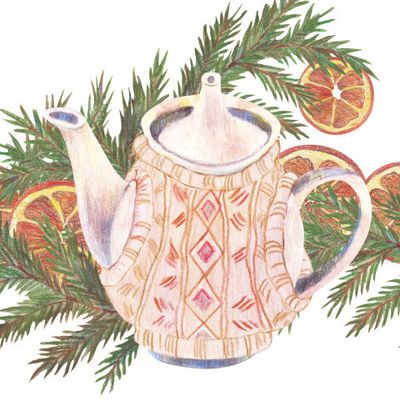 Чайник с еловыми ветками и апельсинами