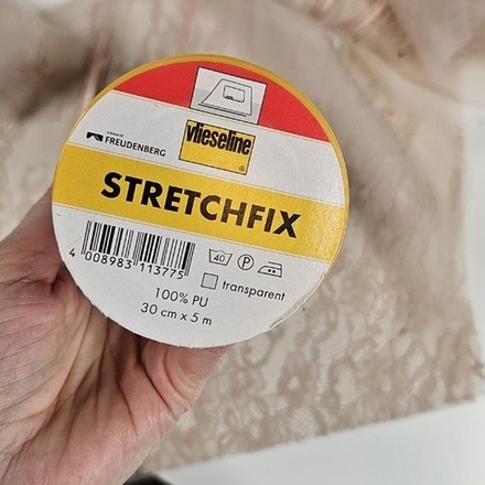 Стрейчфикс (StretchFix). Клеевая паутинка на бумажной основе, эластичная.