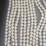 Жемчуг культивированный крупный овальный с бороздками, белый, 9-10*10-12мм