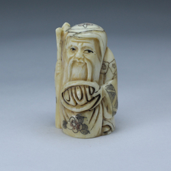 Нэцкэ Фукурокудзю с мешком и посохом