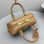 Miu Miu Matelasse Nappa Leather Top Handle Bag 24 cm
