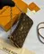 Сумка-клатч Louis Vuitton Liv, коричневый