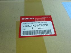 42650-K94-T10ZC. WHEEL SUB ASSY., RR. *NH303M*. HONDA