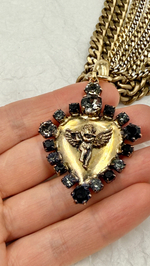 Колье кулон сердце с ангелом с флейтой, по краю черные и серые кристаллы на цепочках, золото антик
