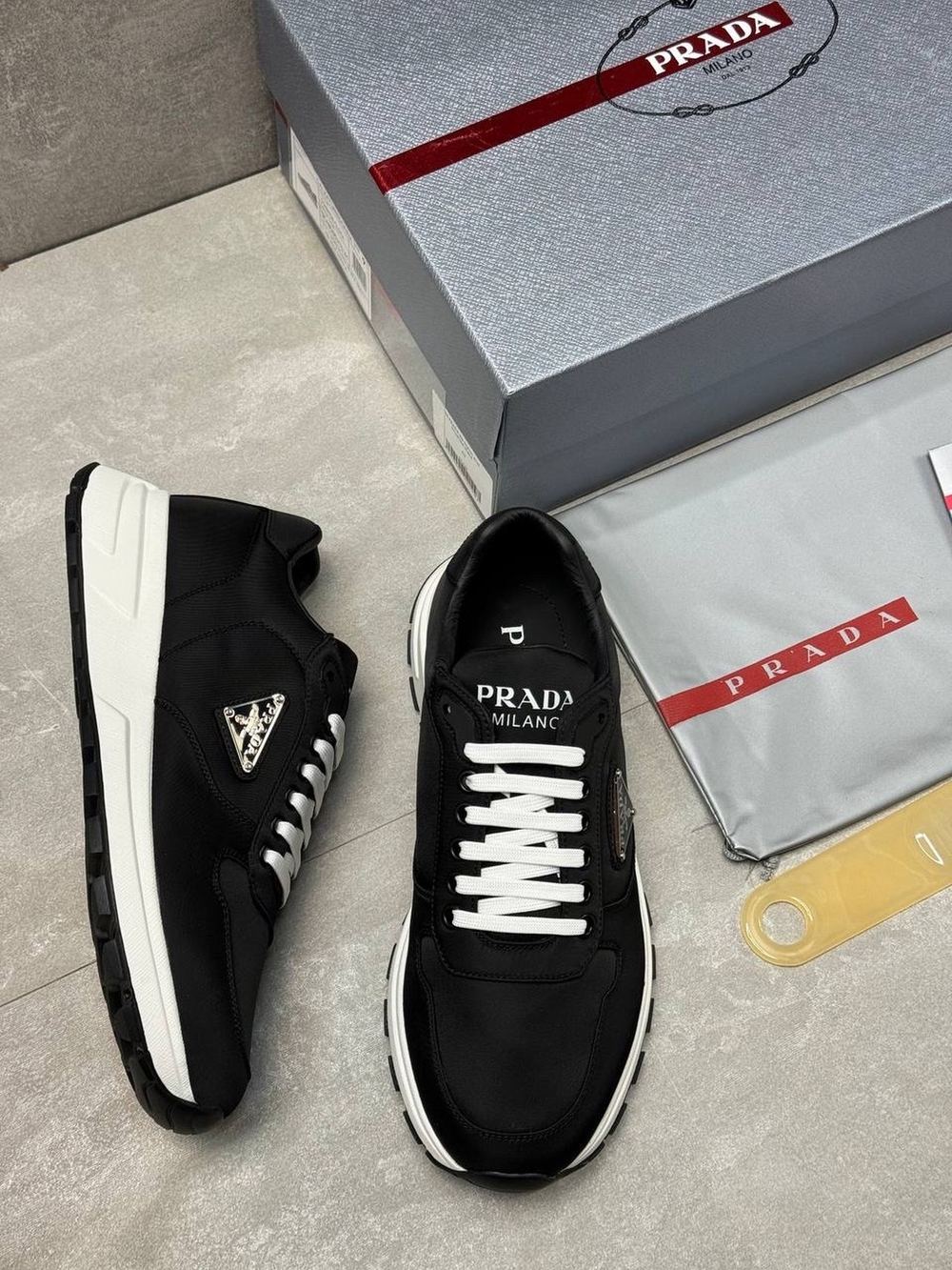 Кроссовки Prada