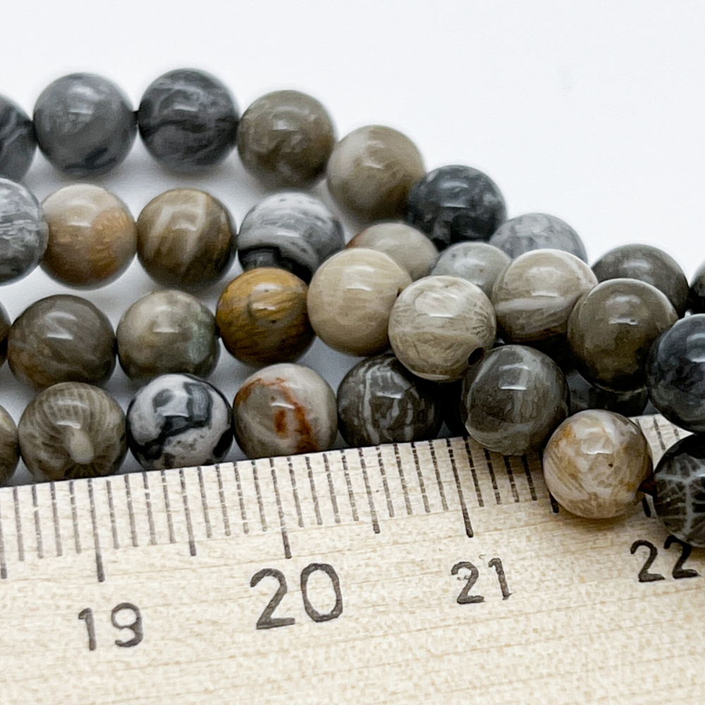 Бусины Коралл окаменелый, диаметр 6,2-6,4 мм, цена за 16 шт (1/4 нити)