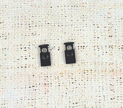 Фиксатор для шнура металл, р. 19.5х8.86 мм,отв.4 мм, чёрный