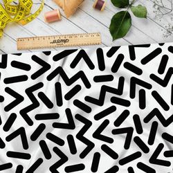 Ткань интерлок крупные черные детальки