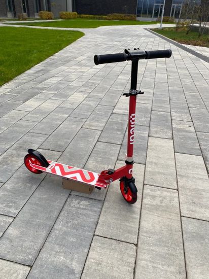 Складной двухколёсный самокат со светящимися колёсами и платформой Micar Flash 145 красный