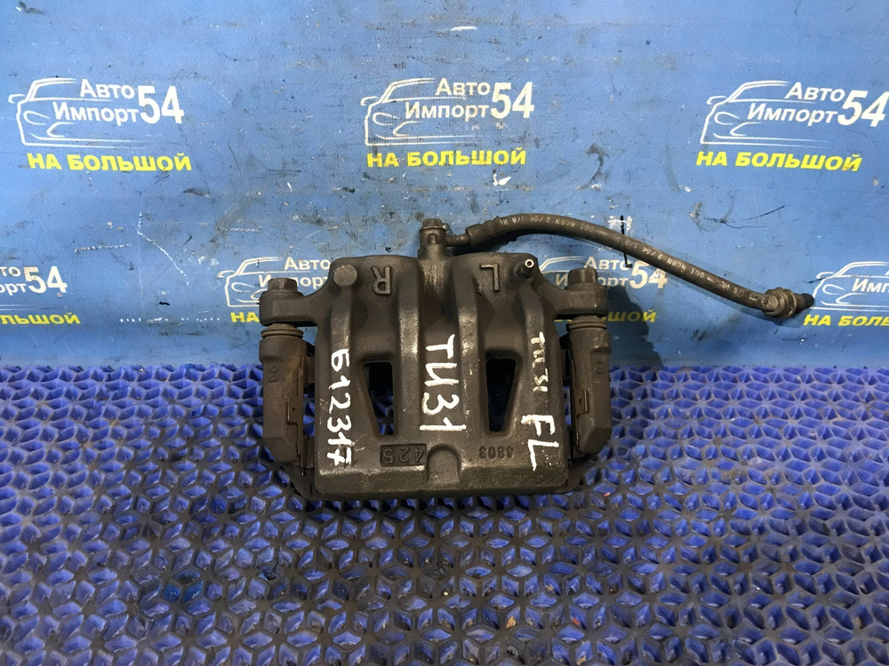 Суппорт тормозной передний левый NISSAN PRESAGE 2003-2009