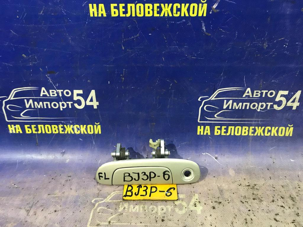 Ручка двери передней левой внешняя MAZDA FAMILIA 1999