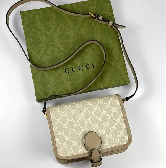 Миниатюрная сумка через плечо Gucci Interlocking G