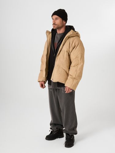 Бежевый объемный пуховик QWE