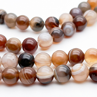 Агат тонированный кофейный, диаметр 8,1-8,3 мм, цена за 11 шт (1/4 нити)