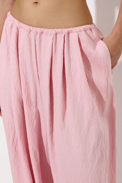 Брюки алладины из вискозы розового цвета
