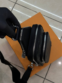 Сумка-слинг Louis Vuitton