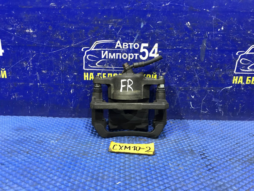 Суппорт тормозной передний правый TOYOTA IPSUM 1997