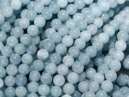 Нить бусин из тонированного кварца 6,5мм, гладкие