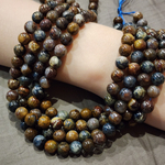 Питерсит, пестрый, гладкий шар 8 - 8.2мм, цена за нить 9.5см (1/4)