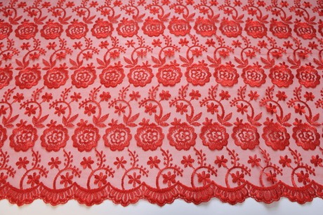 Вышивка на сетке красная