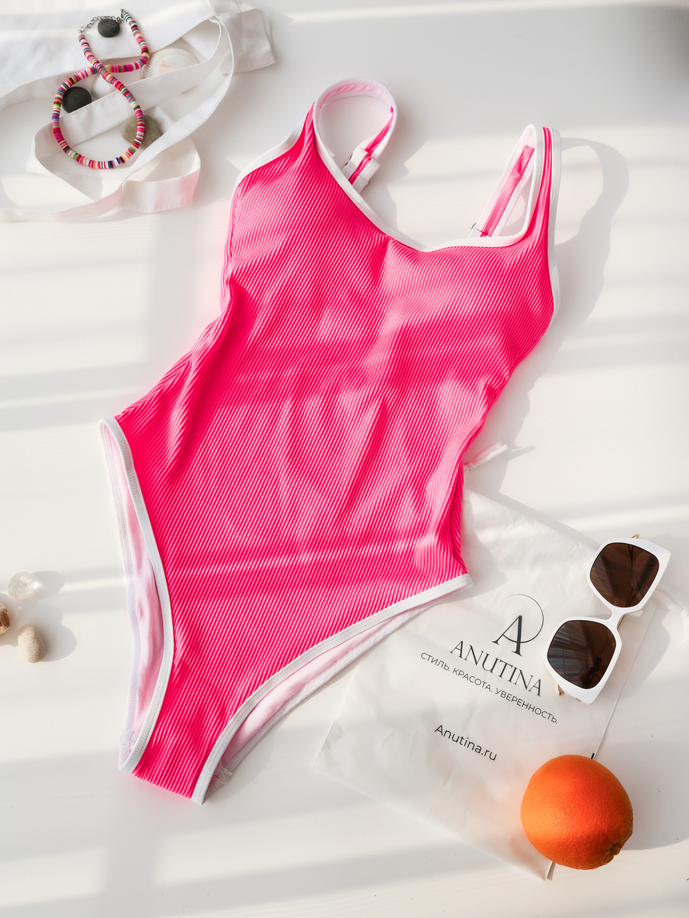 Розовый купальник слитный в рубчик, размер M