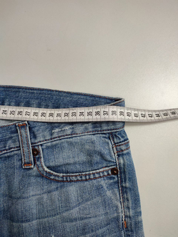 Джинсы с рваным эффектом 42 размер