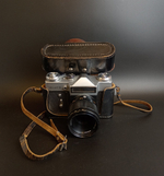 Фотоаппарат "Зенит-Е" с объективом "Индустар 61 L/Z", металл, стекло, кожа, пластик, Красногорский механический завод (КМЗ), СССР, 1977 г.
