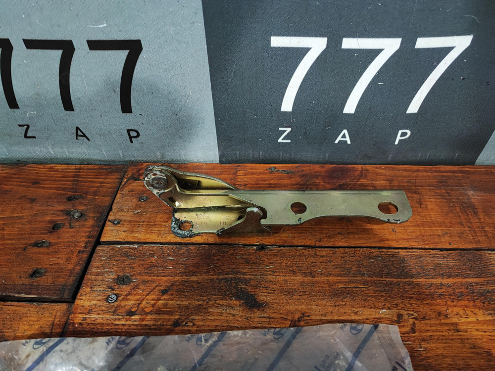 Петля капота левая Hyundai Accent 2 00-12 Новая Оригинал 7911025001