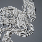 Магнезит натуральный, 2,5мм, шар, микроогранка