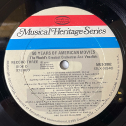 Винтажная виниловая пластинка LP Сборник Музыка Из Американских Фильмов 50 Years Of American Movies (USA 1977) (Star Wars, Gonna Fly Now, Moon River)