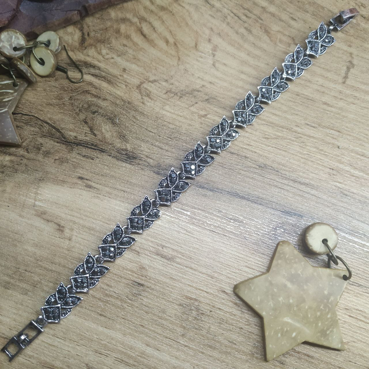 Браслет Vogue 2 Треугольник с листочками стразы графитовые металл серебристый