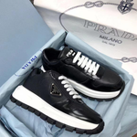 Кроссовки Prada