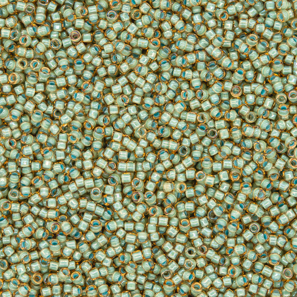 Японский бисер TOHO Round 15/0 (№952), окрашенный изнутри прозрачный