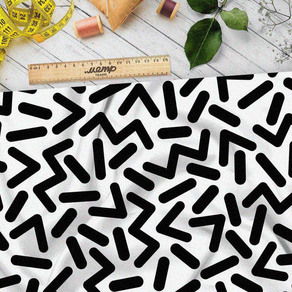 Ткань интерлок крупные черные детальки