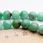 Хризопраз бусины, диаметр 10,2-10,3 мм, цена за 9 шт (1/4 нити)