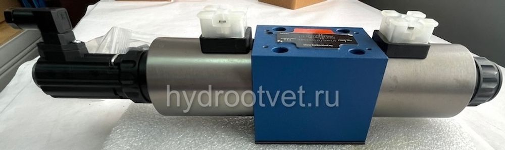 4WRE10W1-50-2X/G24K4/V - Пропорциональный распределитель с обратной связью по положению золотника без встроенной электроники Ду10, номинальный расход 50 л/мин, схема W1-